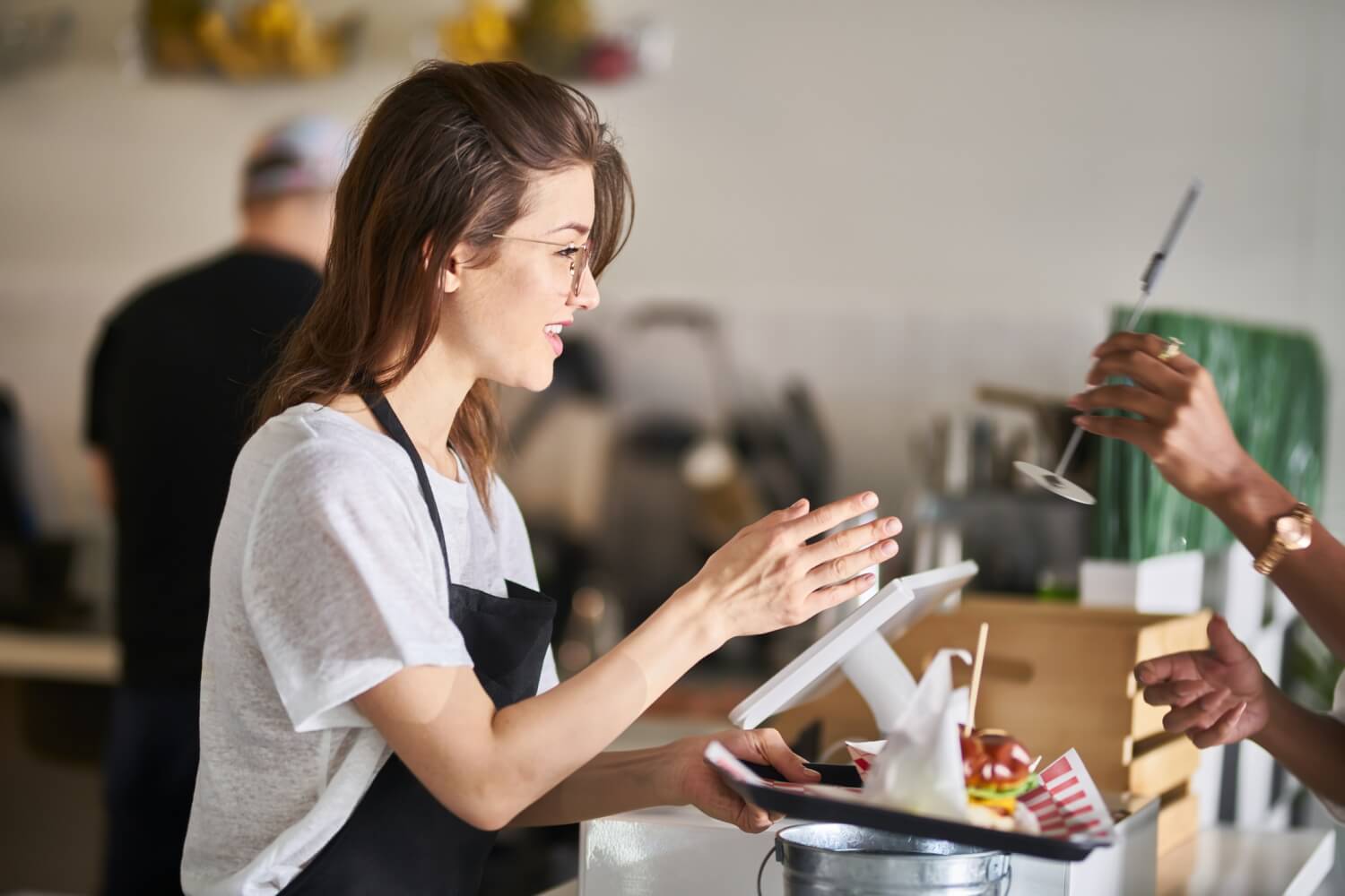 Waitress Handing Order Of Food On Tray To Customer Complete Controller